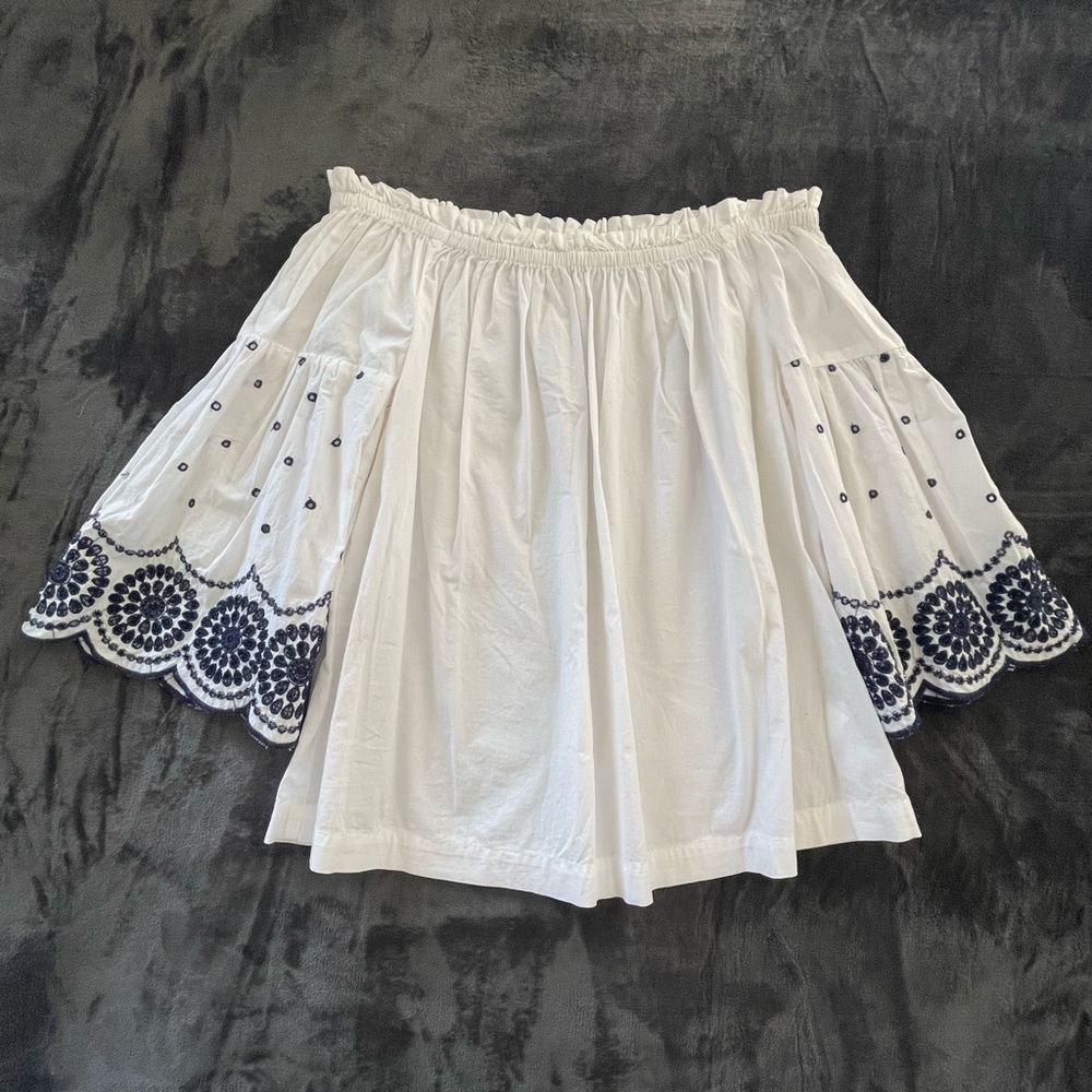 Gap. Medium. White w/blue embroidery on sleeves.